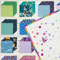 A Scrappy, Rainbow Kristen Quilt